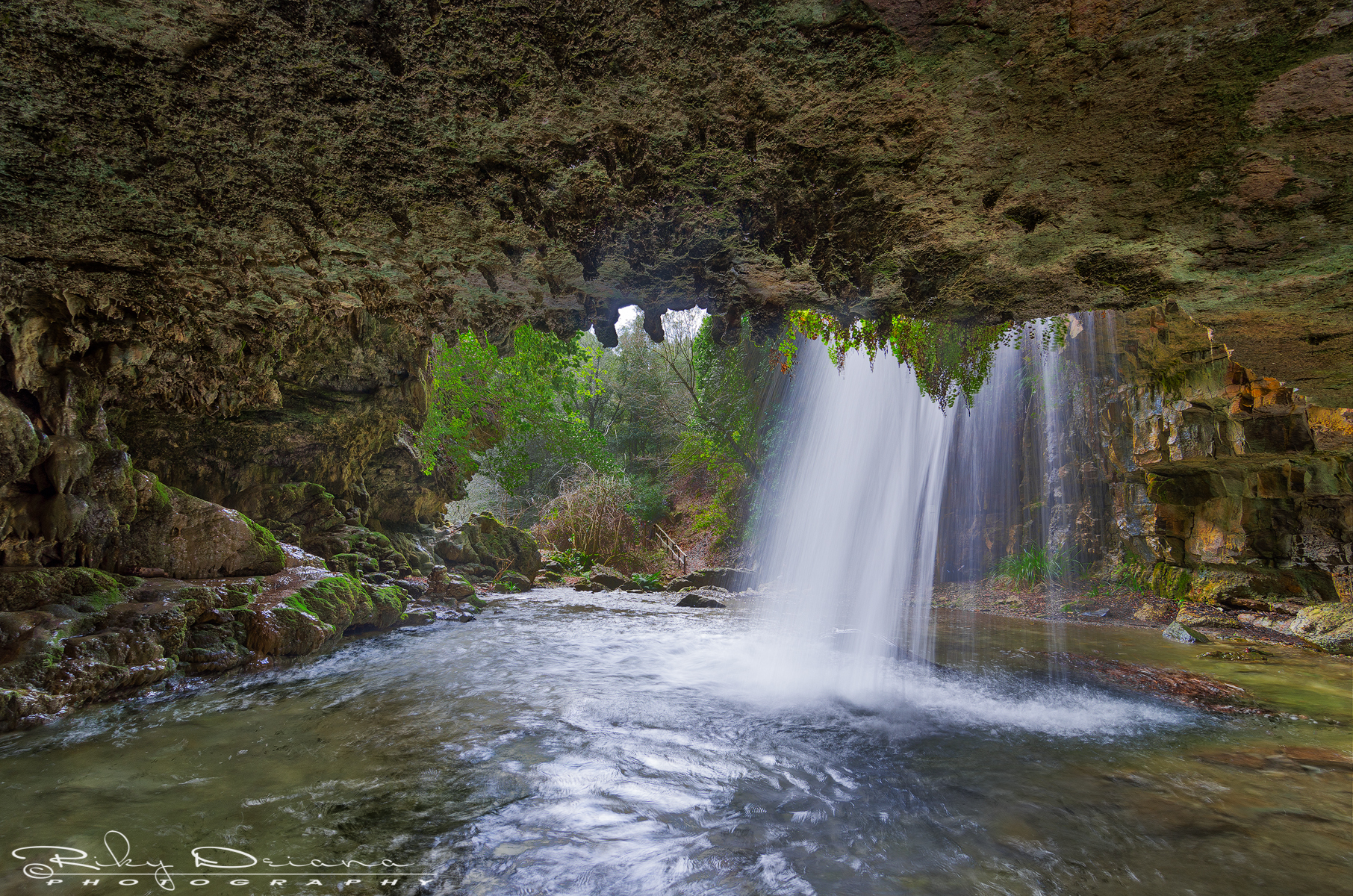Under the waterfall
