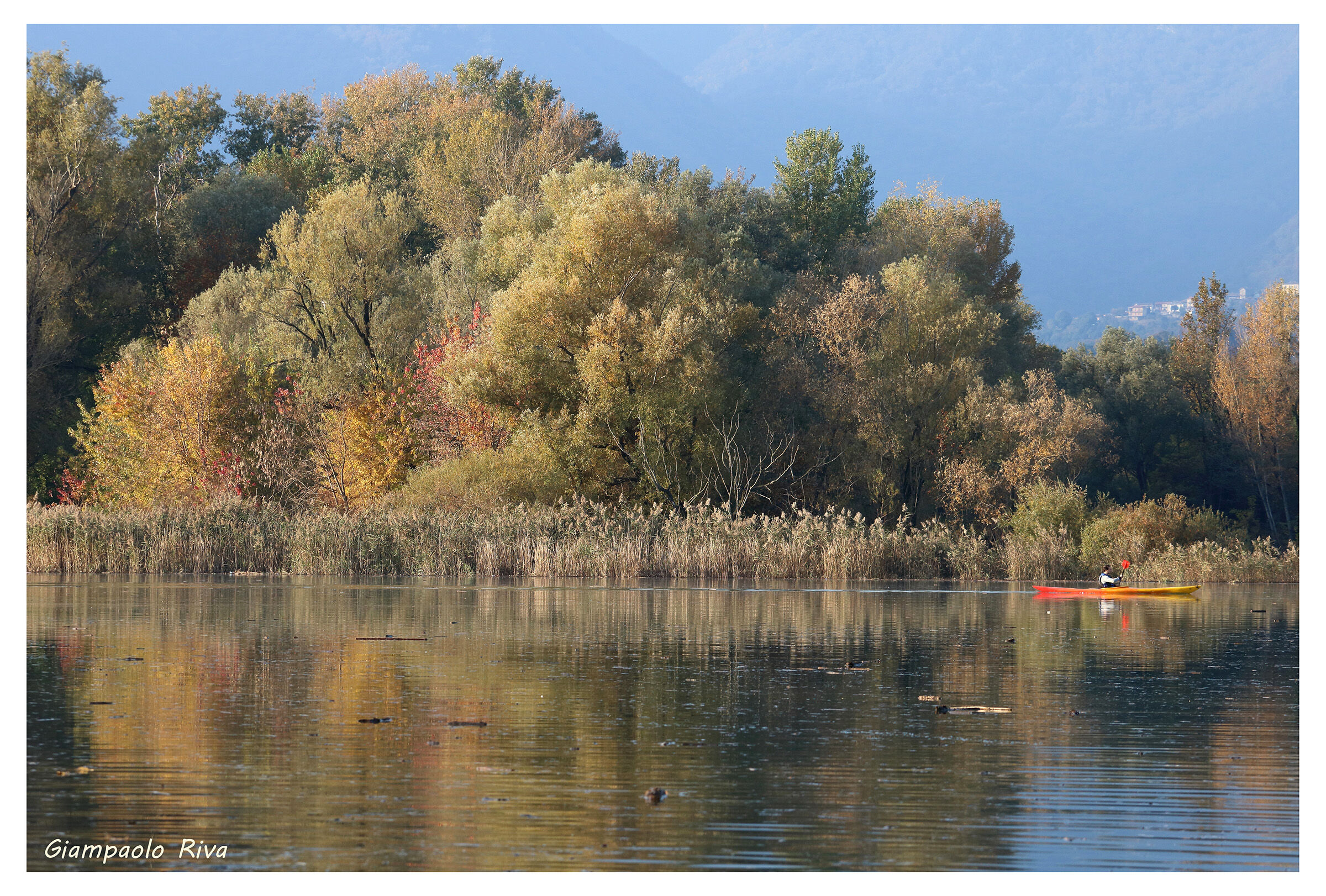 Canoe reflections on Lake Pusiano