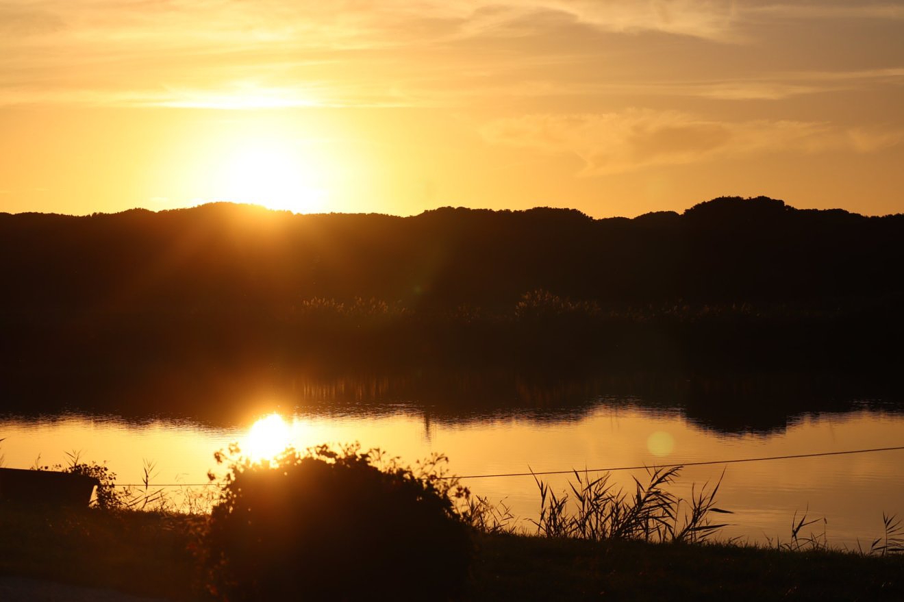 changing sunset light, Lake Tamerici in Coltano