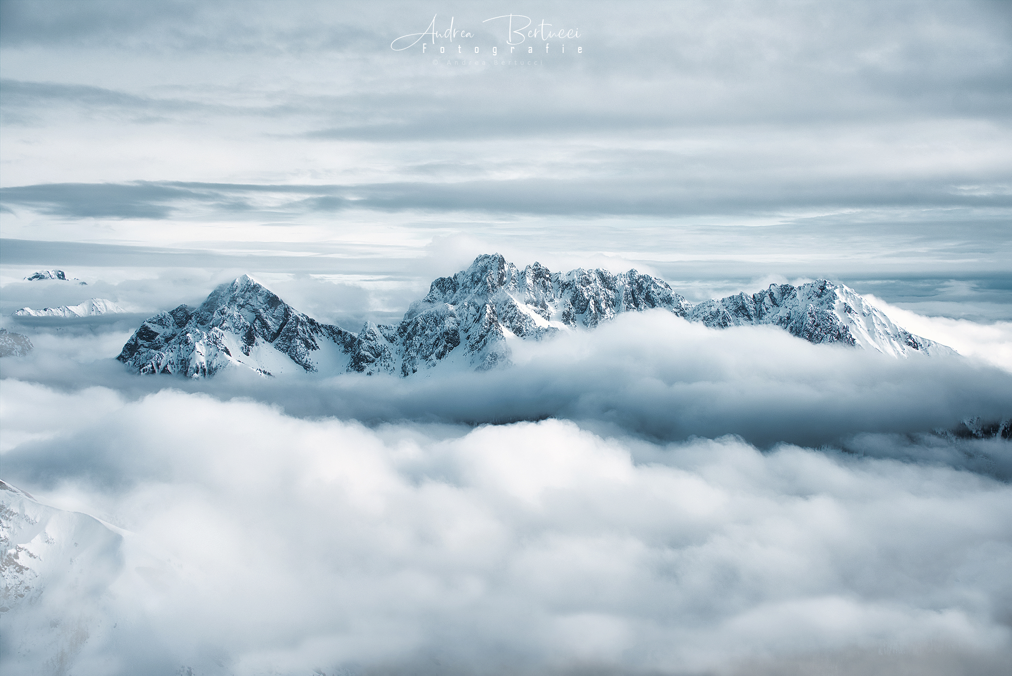 High mountains and cotton clouds