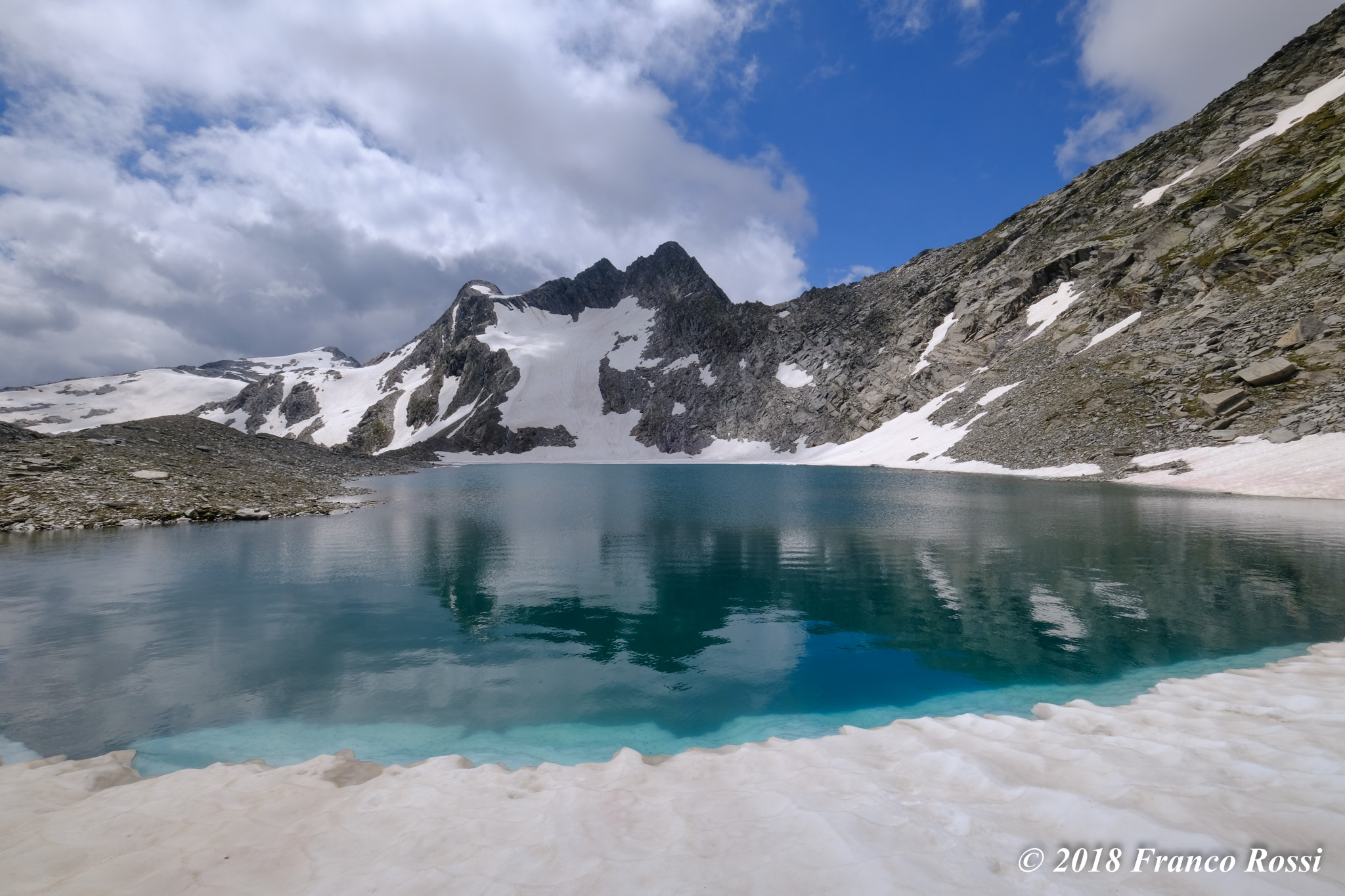 Laj Vert, Lucomagno Pass