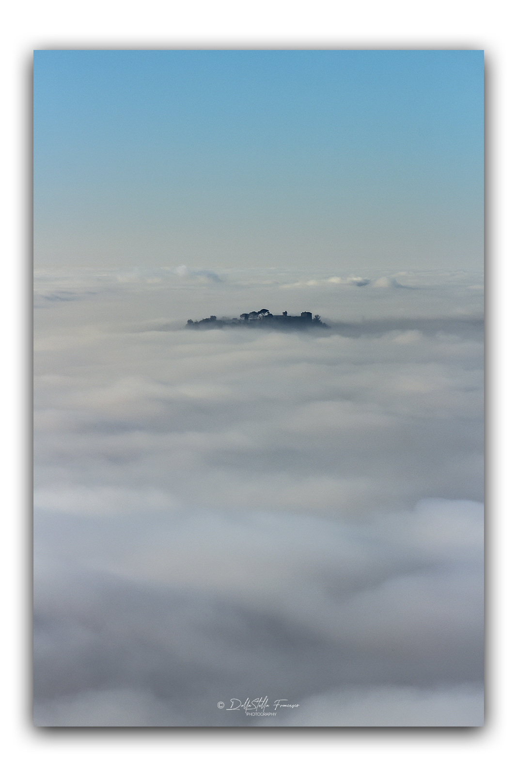 An island in the sea of fog