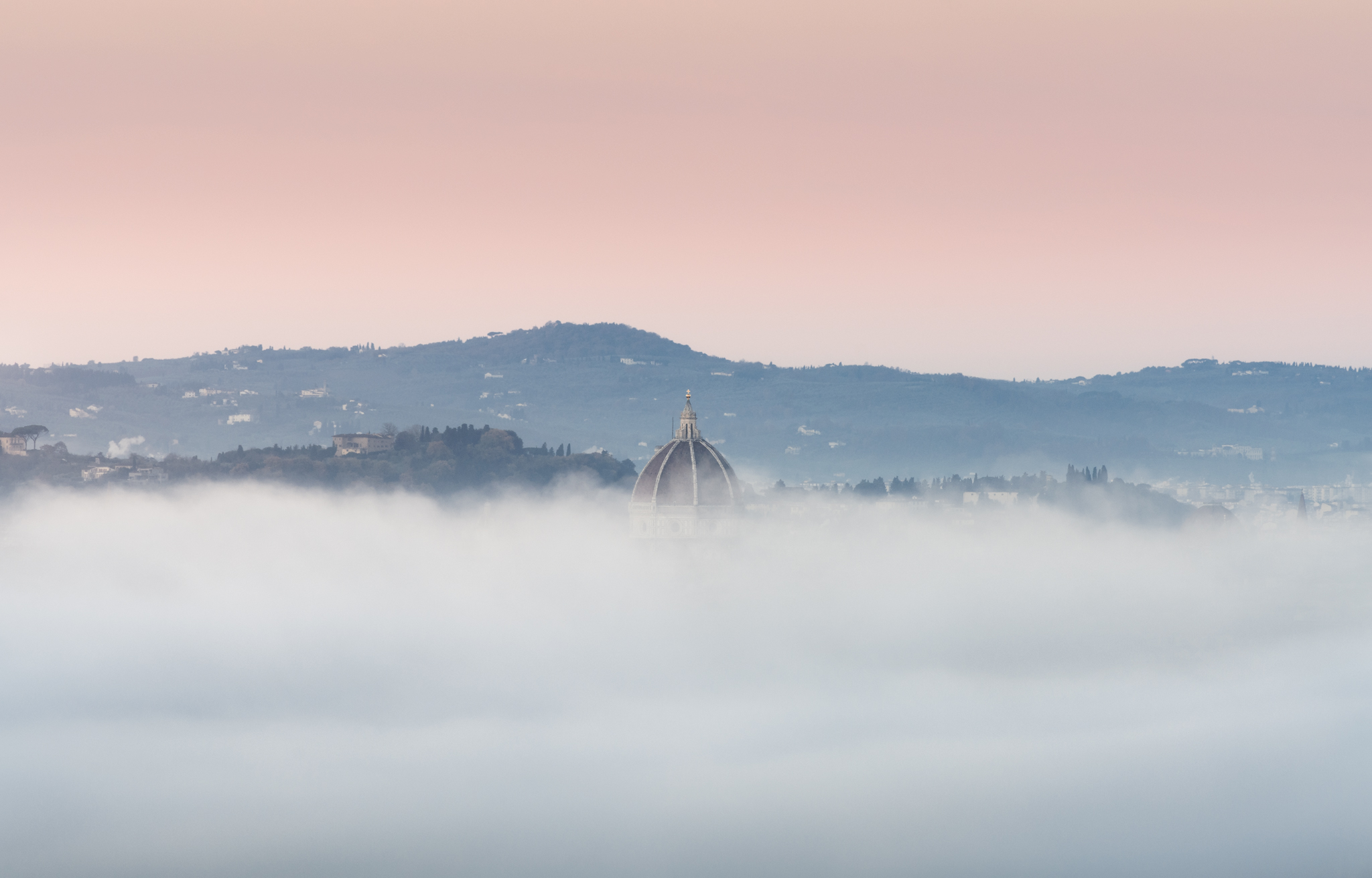 The Duomo comes out of the fog