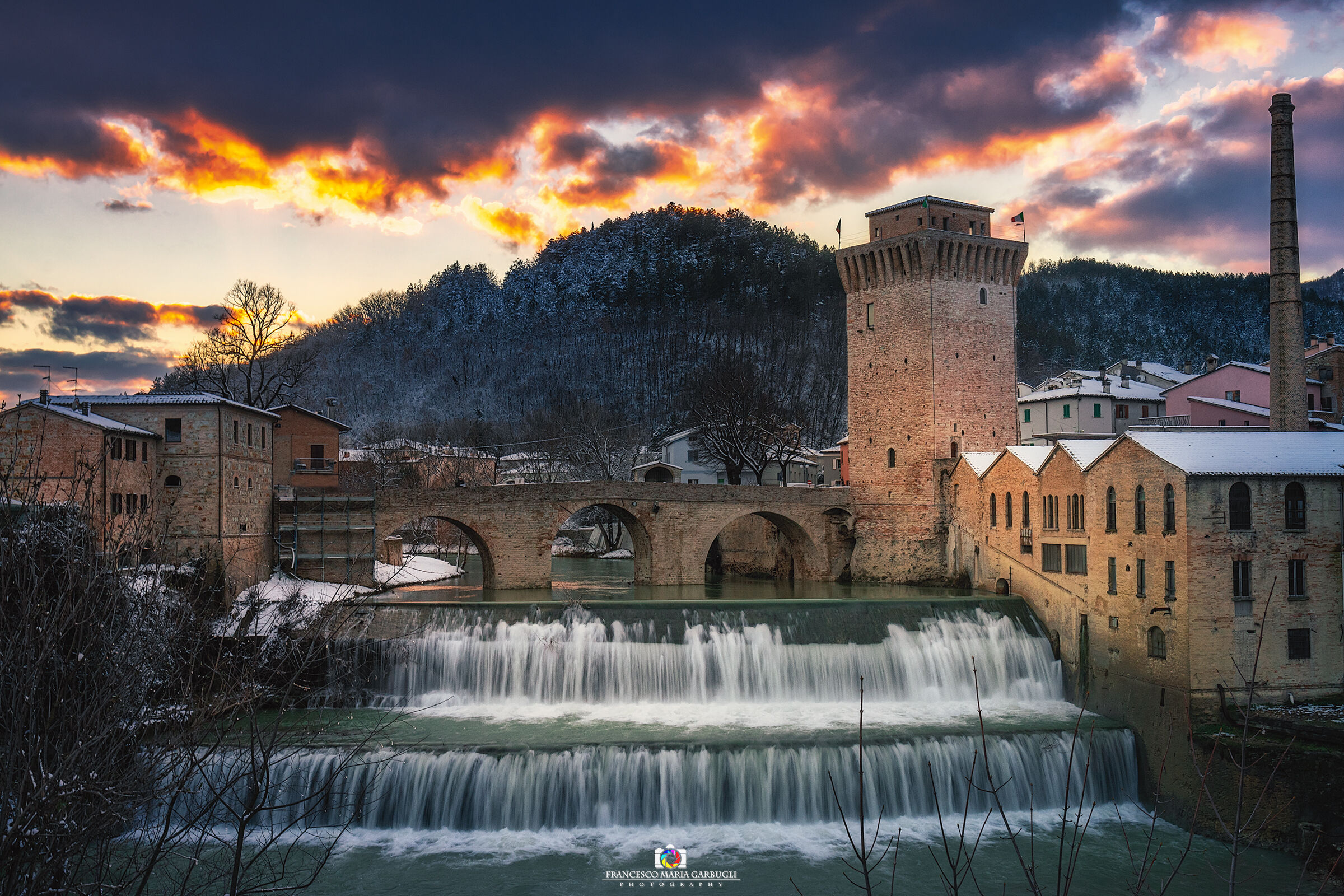 The snow and the Fermignano waterfall