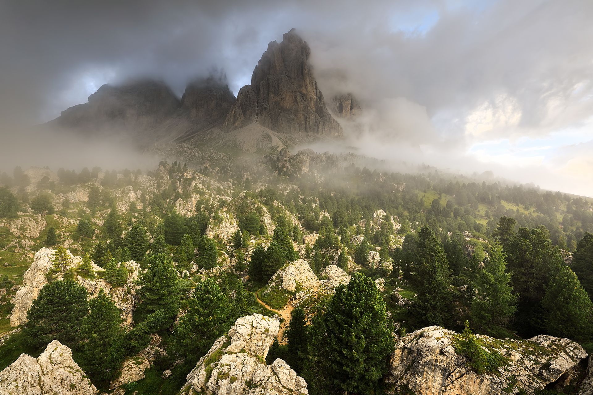 Misty sunrise in the presence of sassolungo