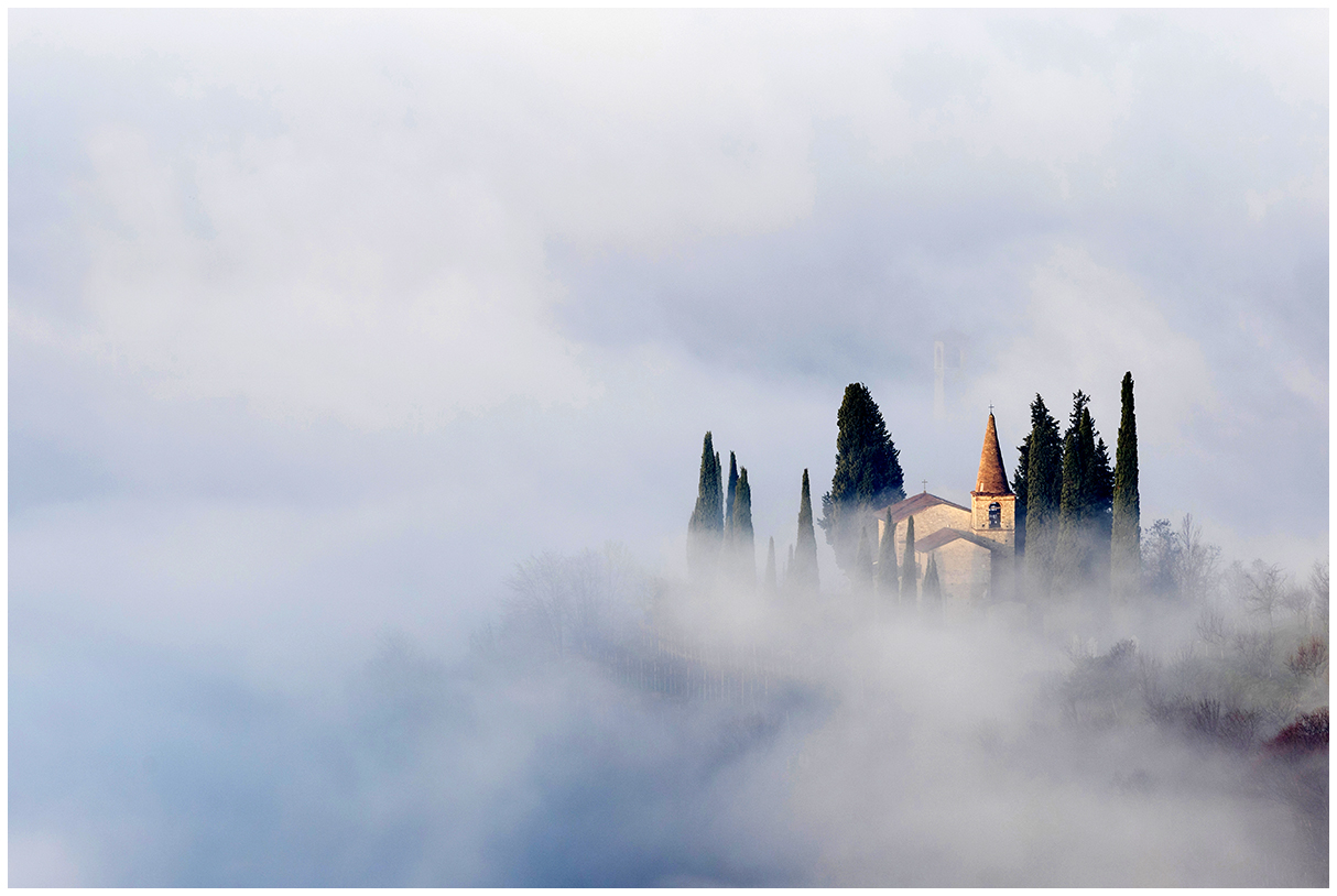 glimmers in the fog.