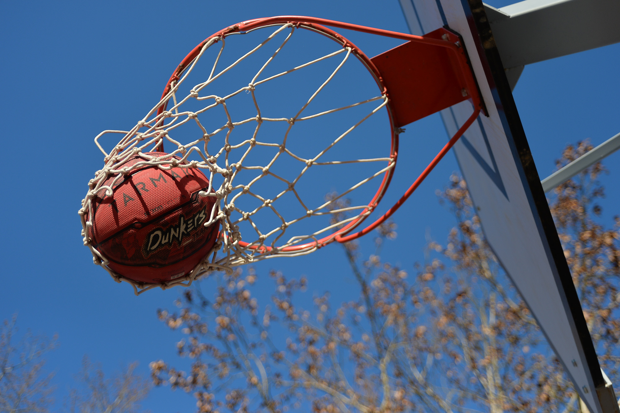 The ball enters the basket