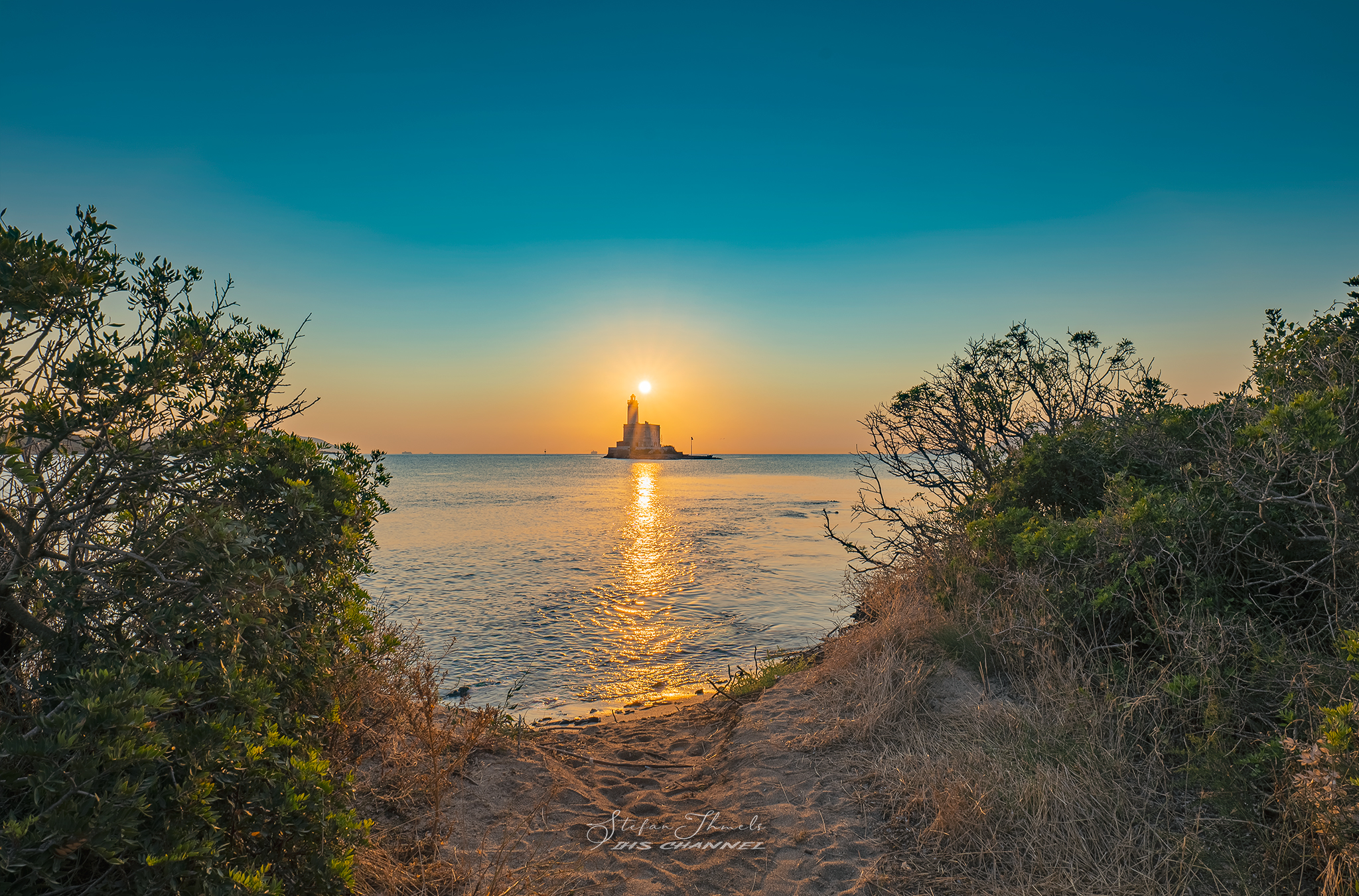 Lighthouse of the island of Bocca in Olbia
