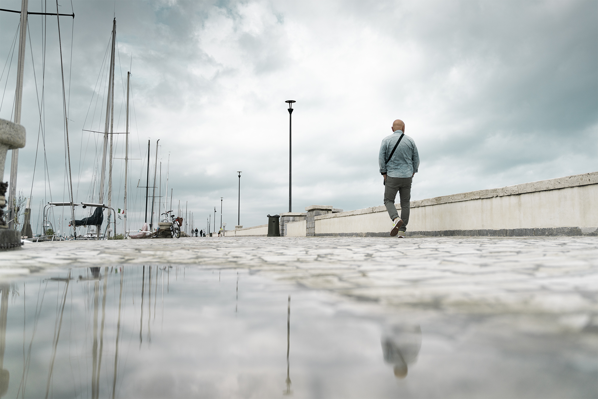 Molo, barche e pozzanghere