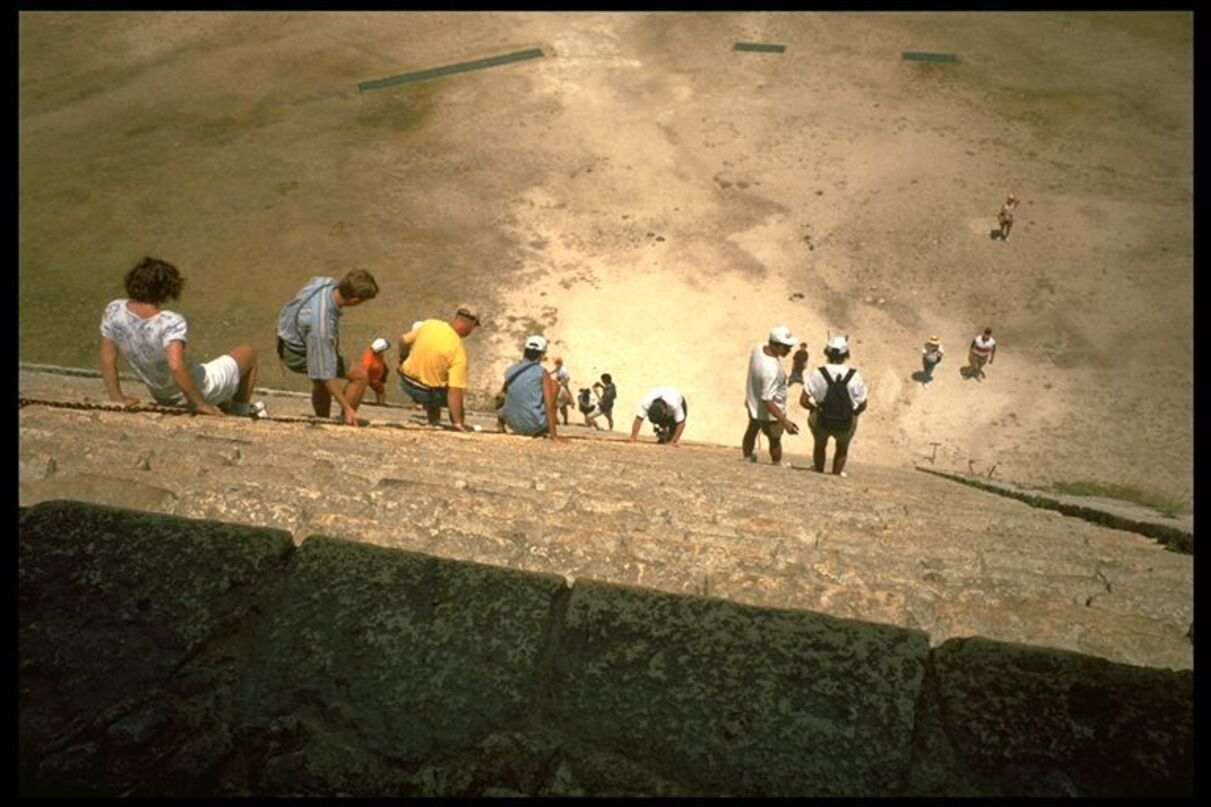 Tourists on Mayan pyramid in Cancun