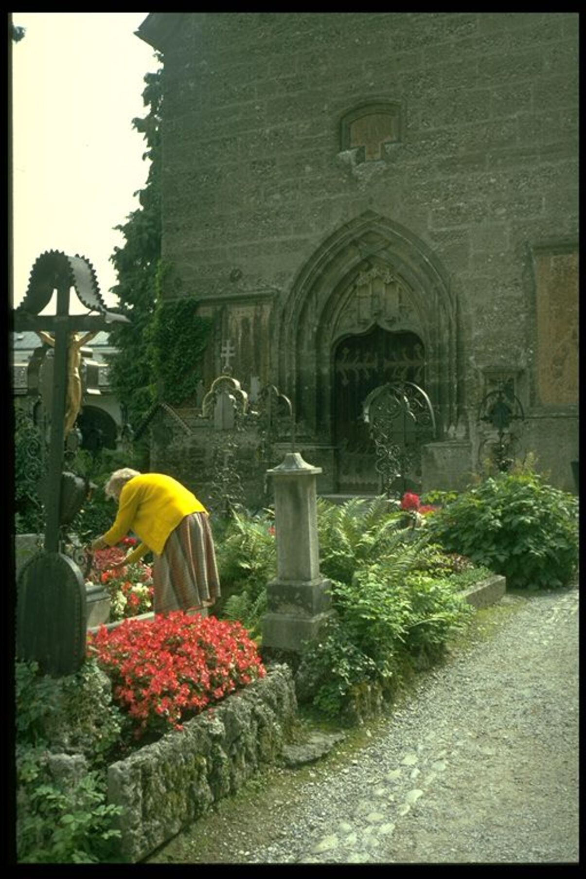 Devotion to the dead in a small cemetery in Salzburg