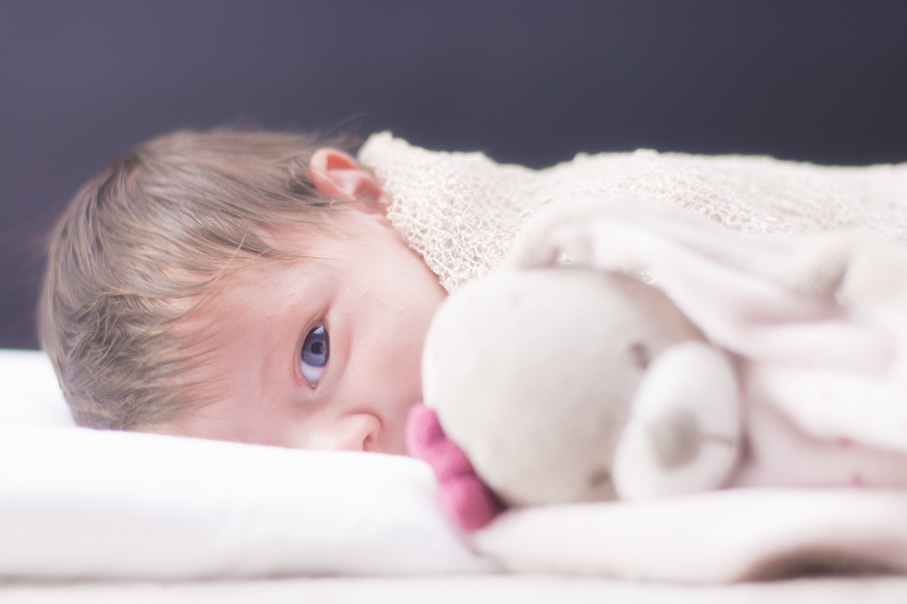 During a newborn session. A 3-week-old baby.