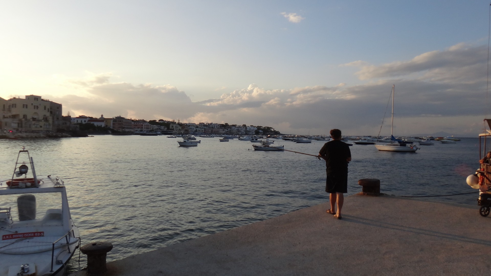 Fisherman at sunset in Ischia