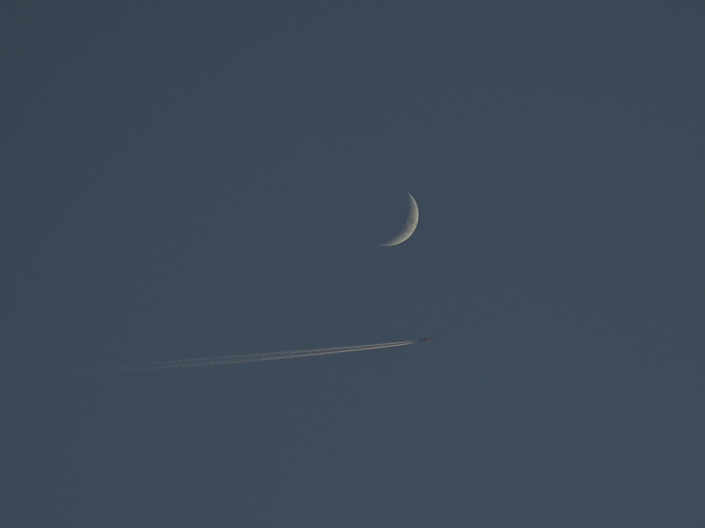 Plane passes into the moon