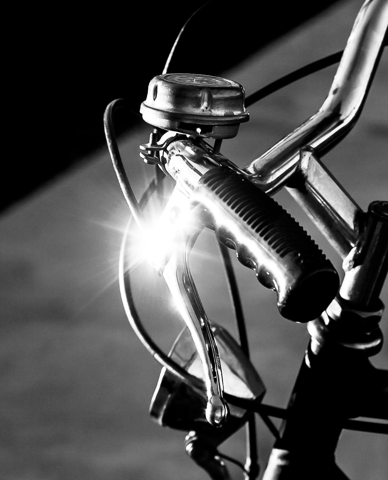 Riflesso su campanello di bicicletta