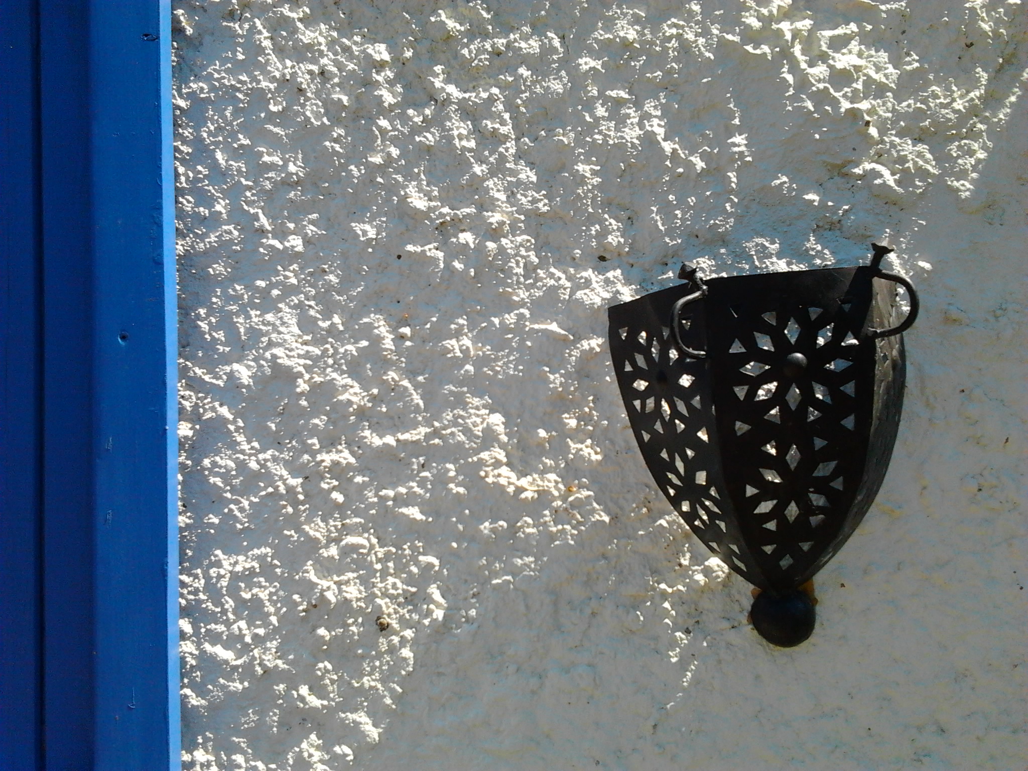 Coso black on white wall