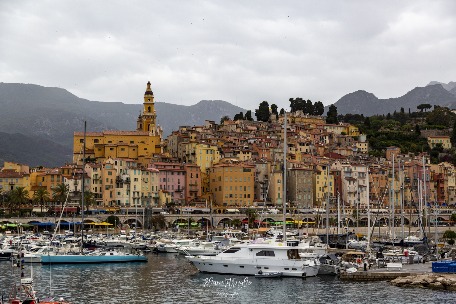 Menton under plumbee clouds