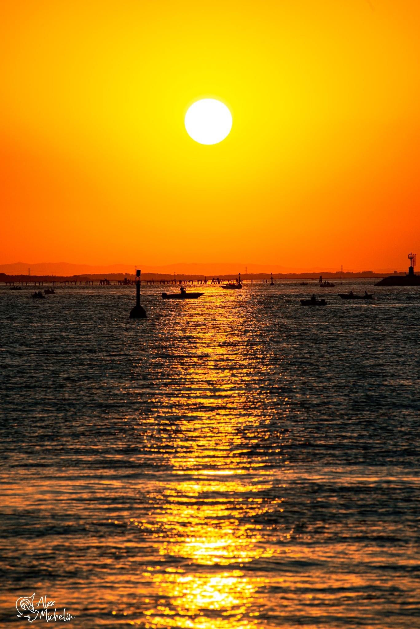 Tramonto in diga a sottomarina