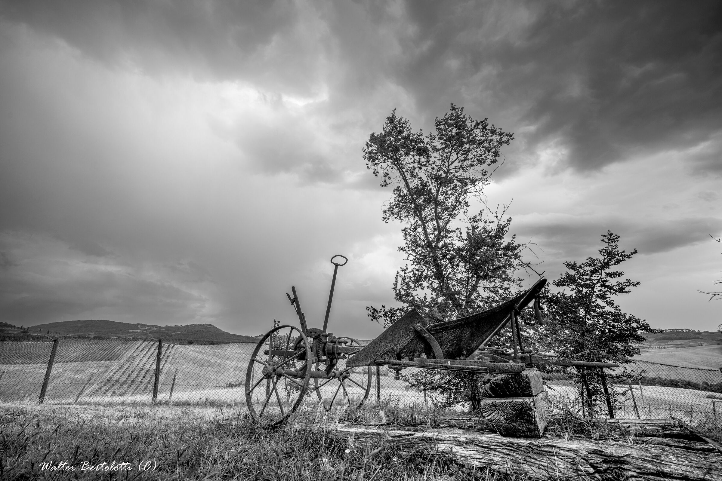 the old plow in black and white