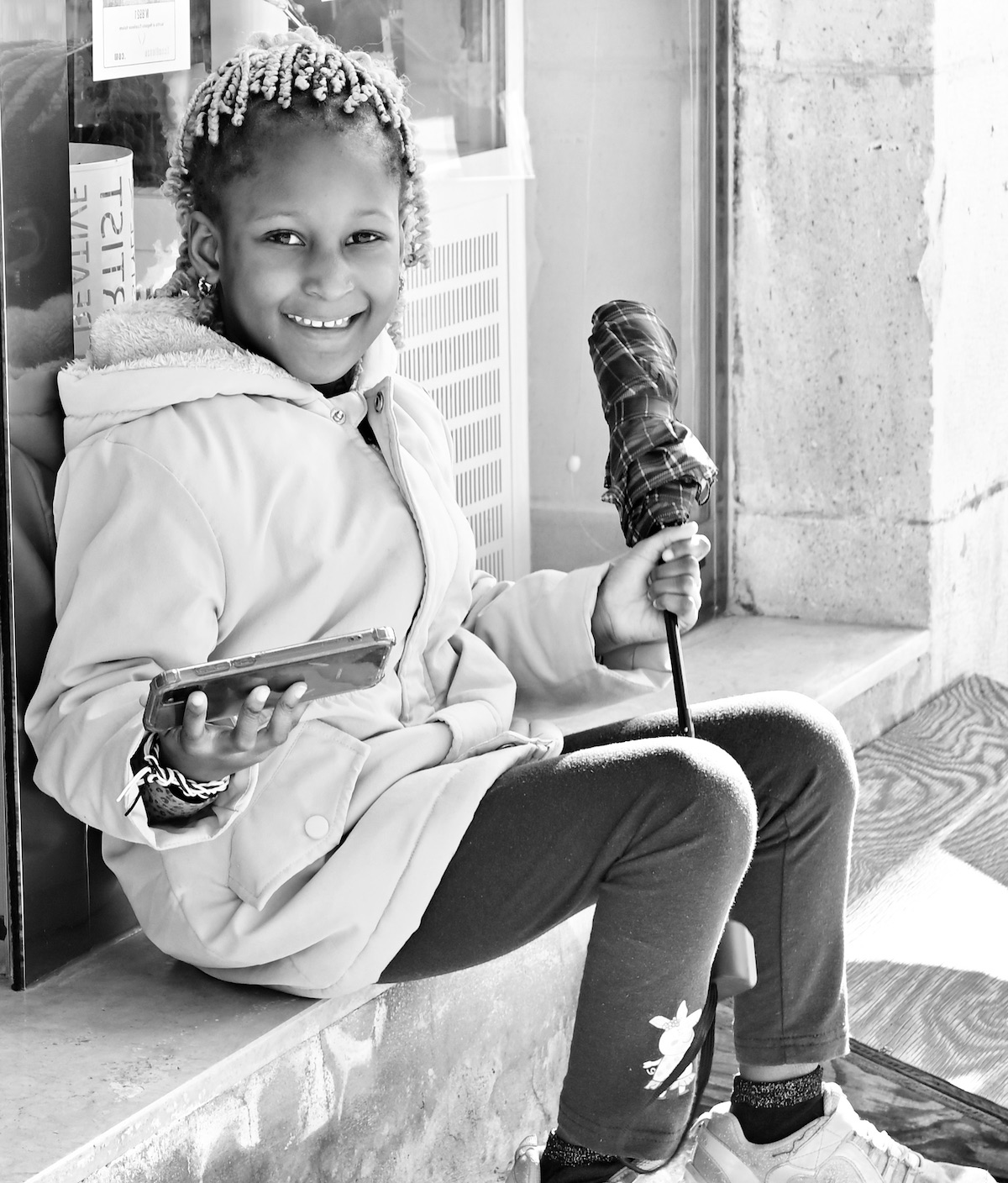 The little girl and the umbrella