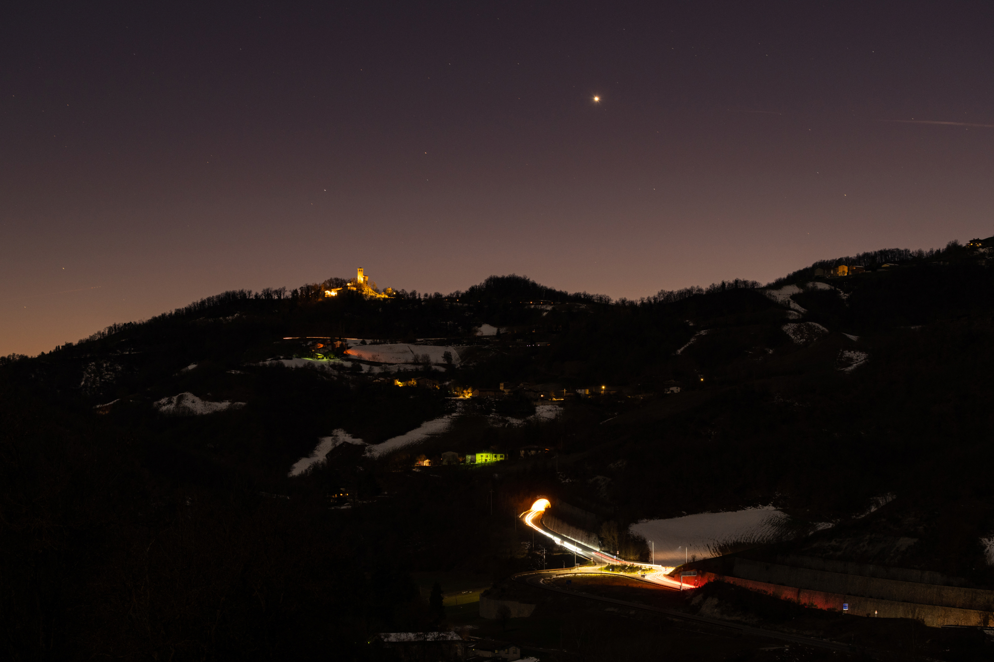 Castle of Sarzano and Venus at sunset