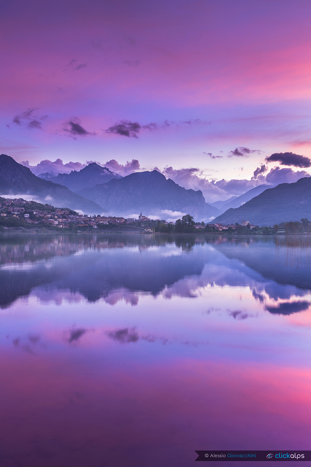 Mirrors at dawn on Lake Annone