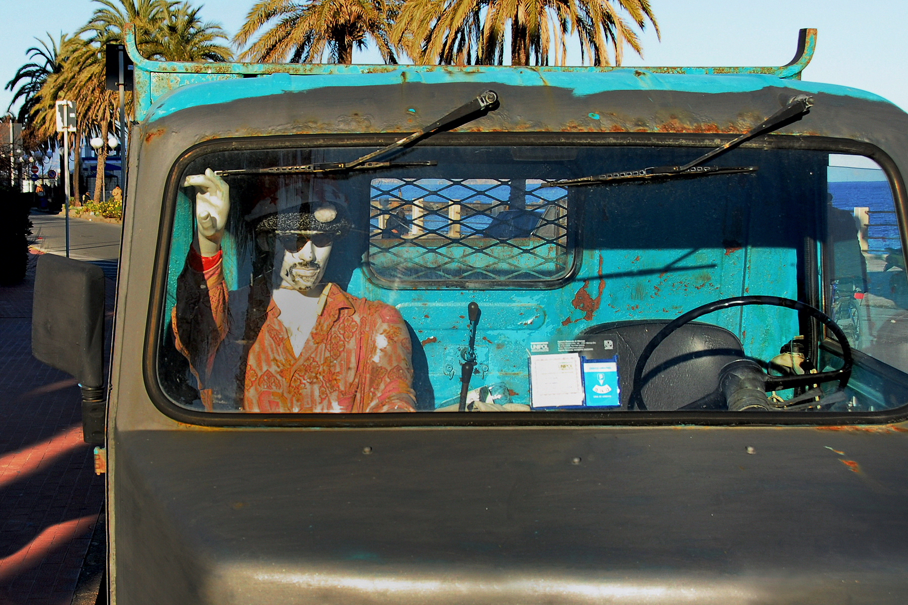 "What does he do there?" "The wife went to get the passport"