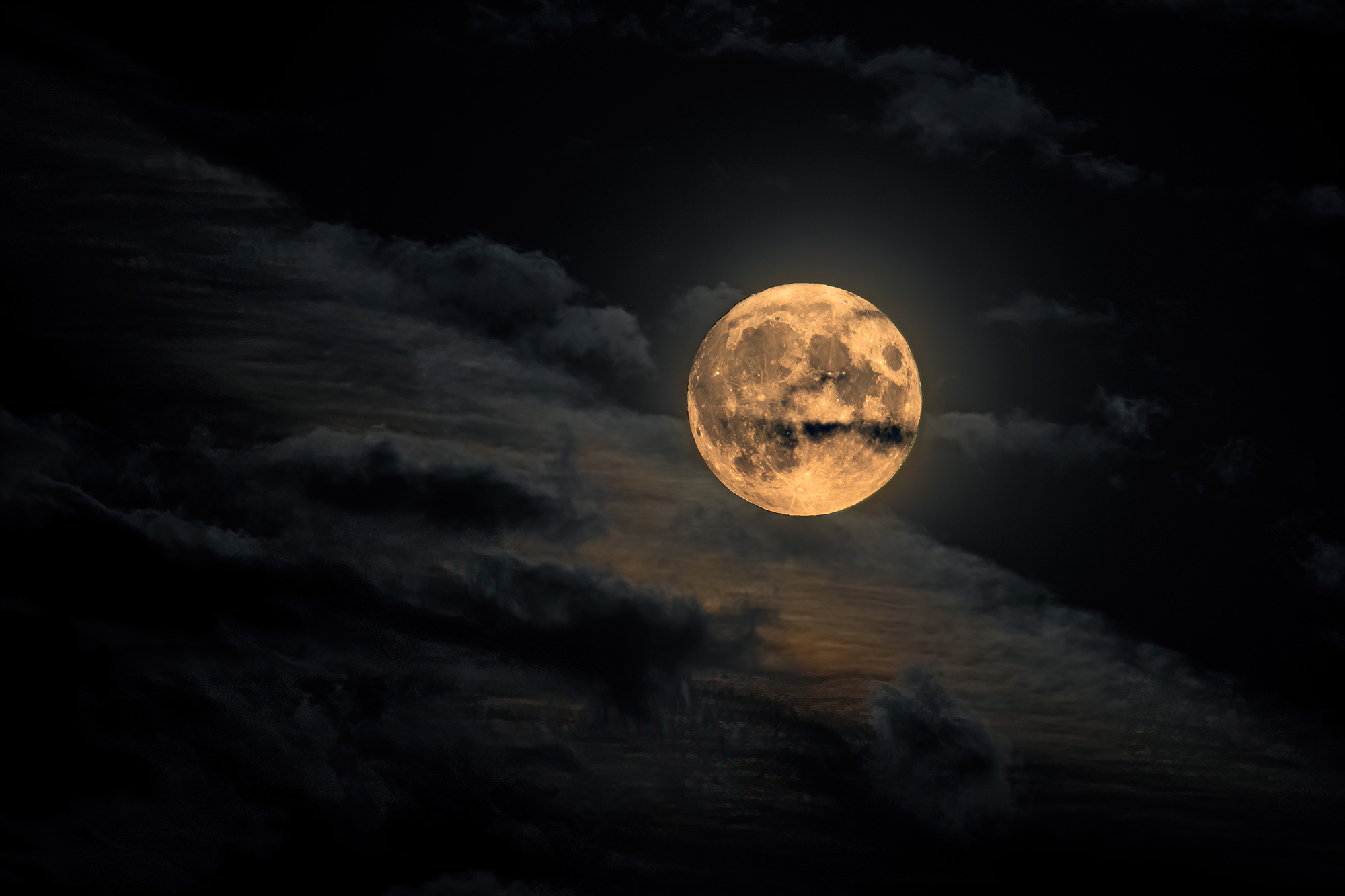super blue moon and clouds