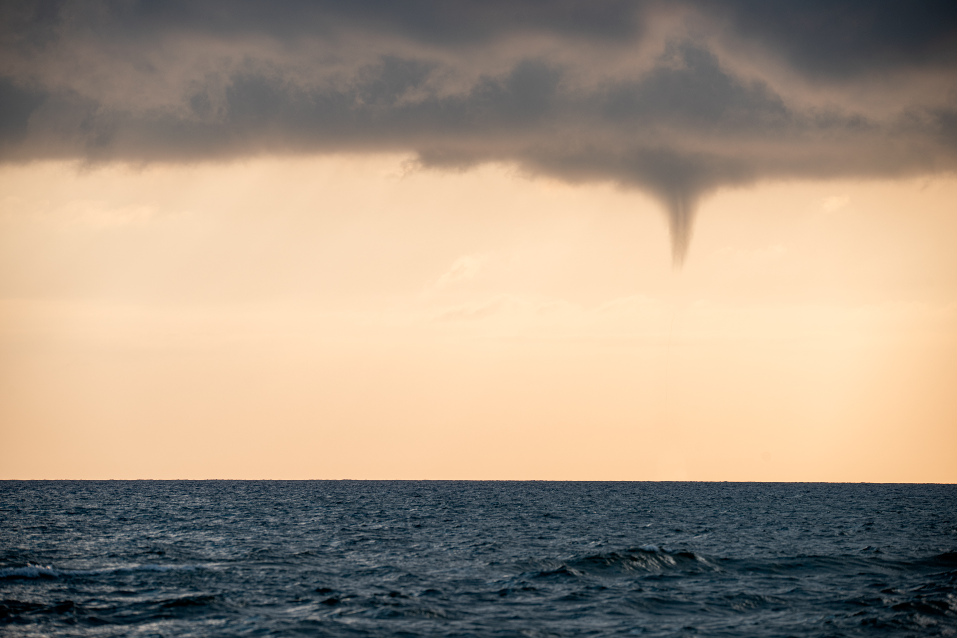 Waterspout at sunset