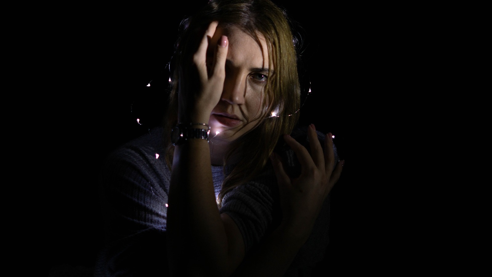 A girl with xmas leds