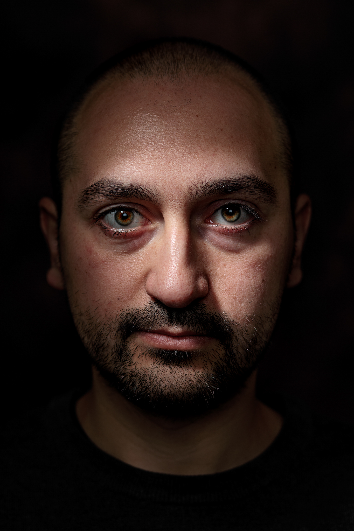 An inexpressive unconventional portrait.