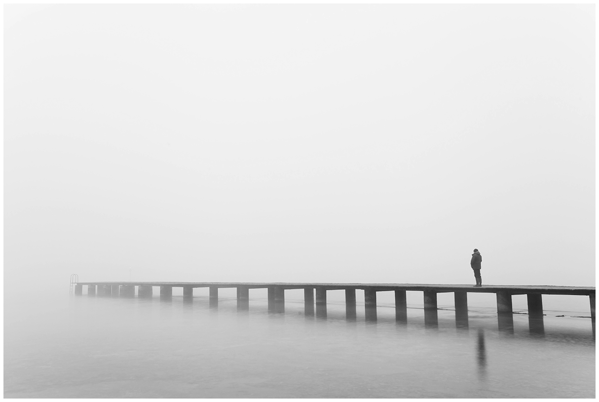 On the jetty in the fog