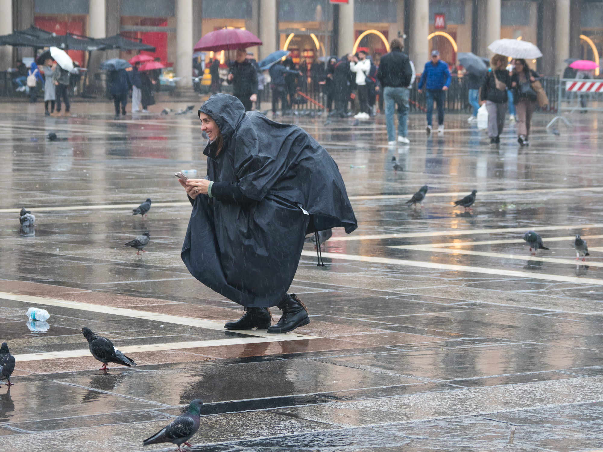 click sotto la pioggia