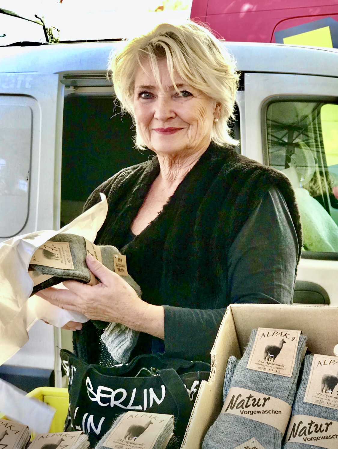 She used to sell alpaca socks and scarves!