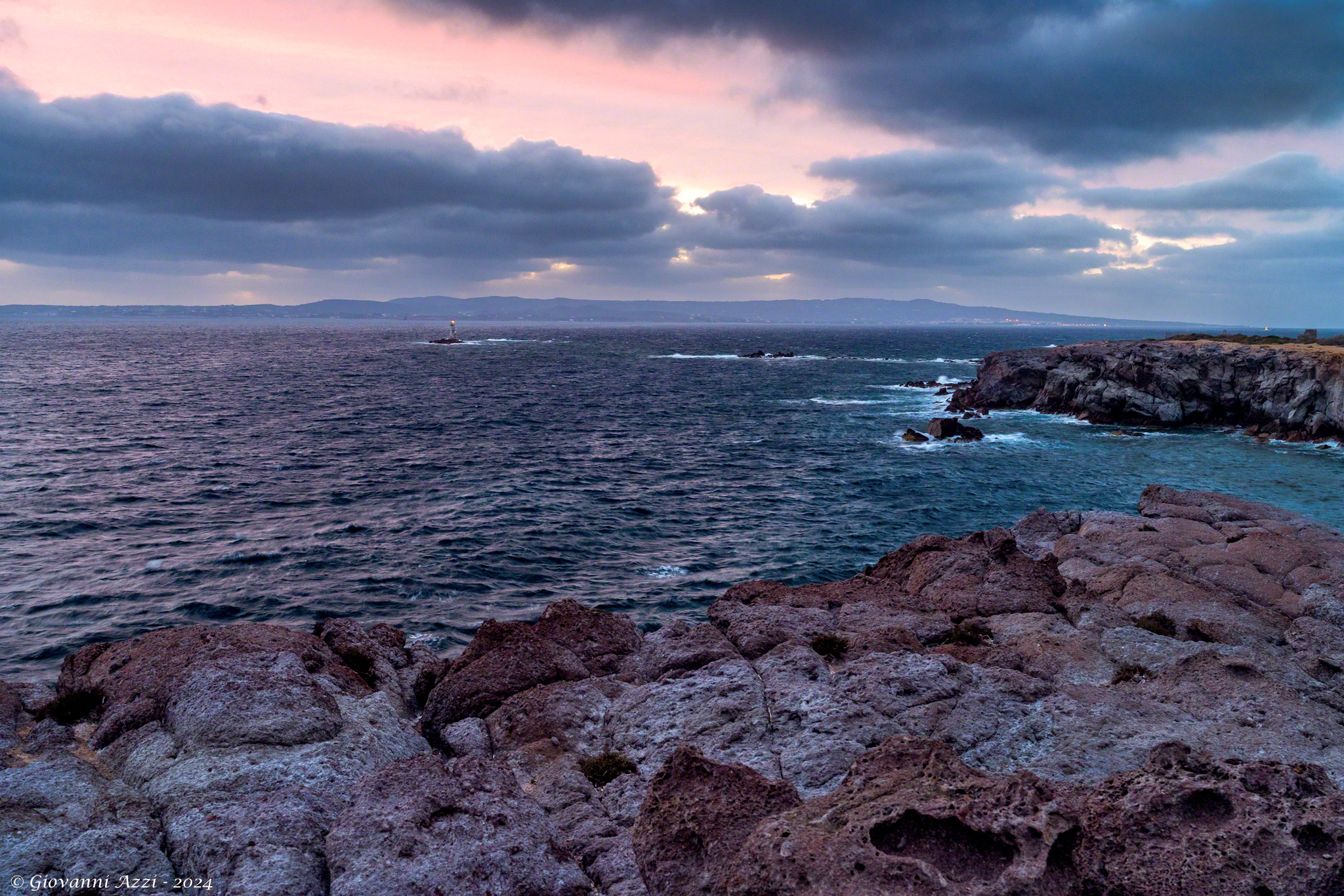 Evening towards Faro Mangiabarche