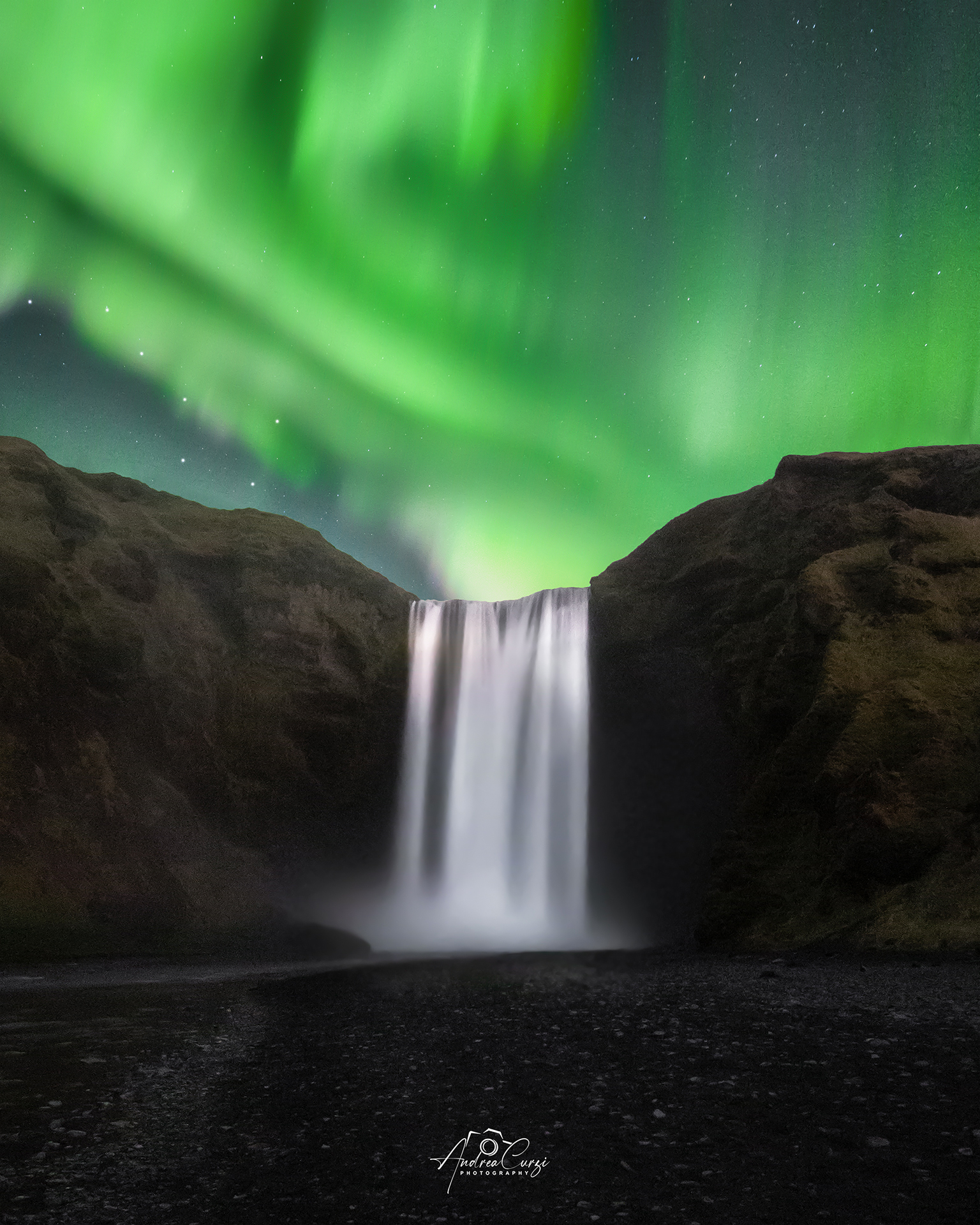 Northern Lights over Skogafoss Waterfall