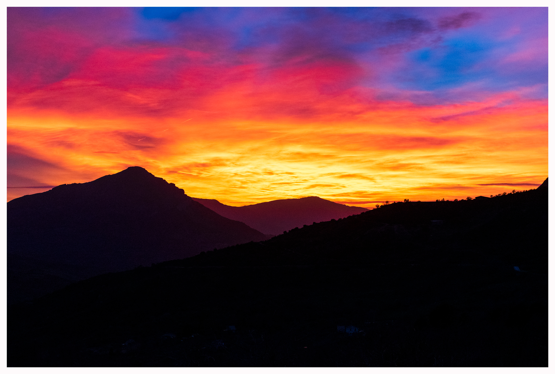 SUNSET IN THE MOUNTAINS