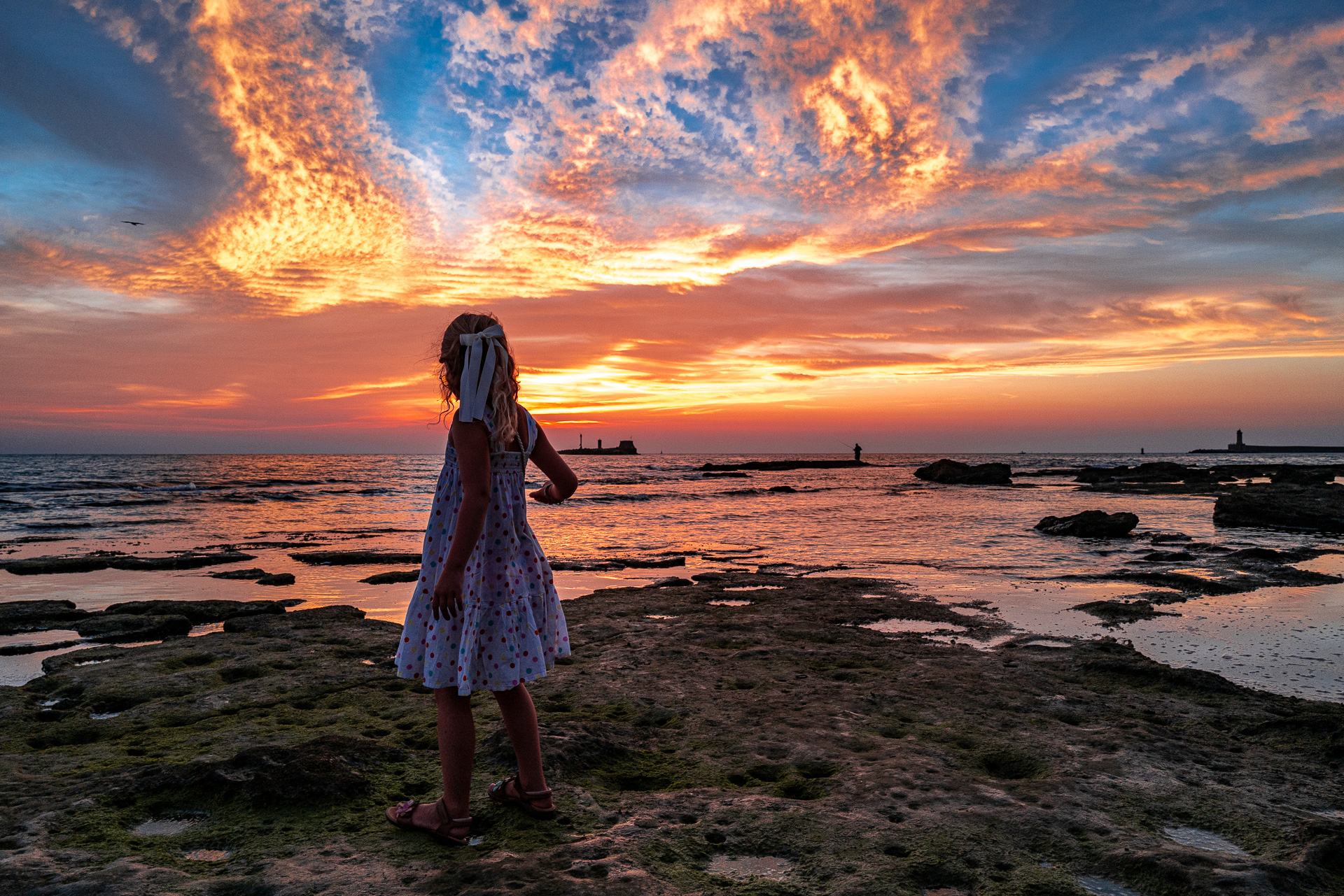 Sunset in Livorno with baby girl