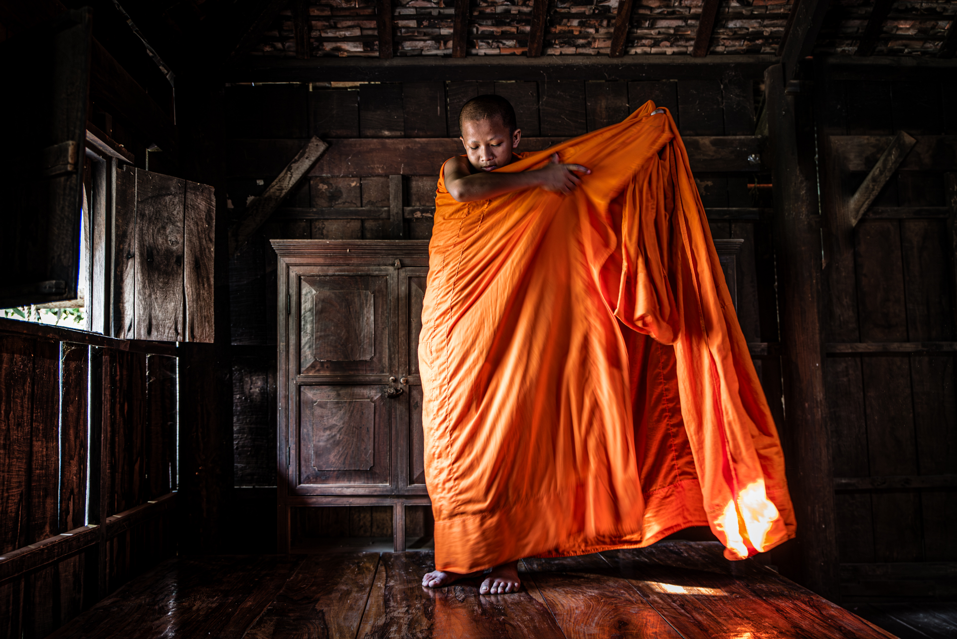 The dressing of the child monk. Cambodia, Jan 2019
