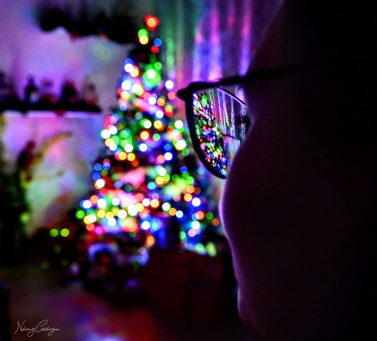 A few Christmases ago, in front of the tree