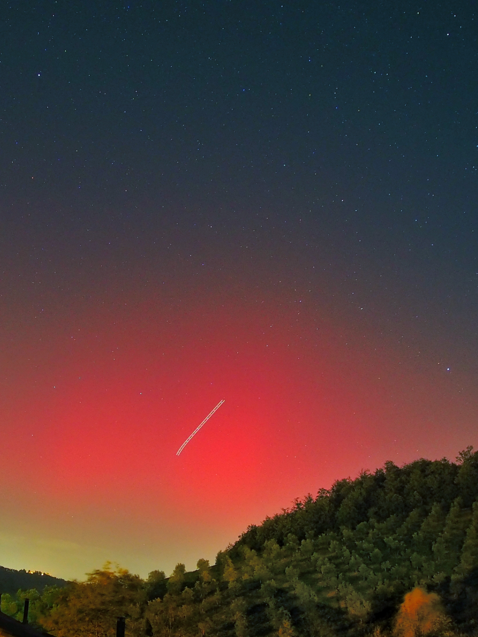 Plane in the aurora in Tuscany