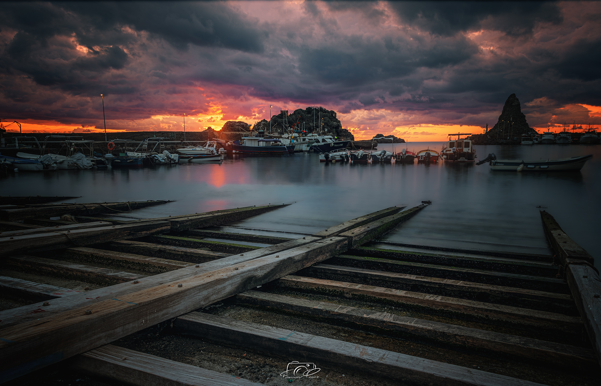 The sunrise of Aci Castello - Sicily