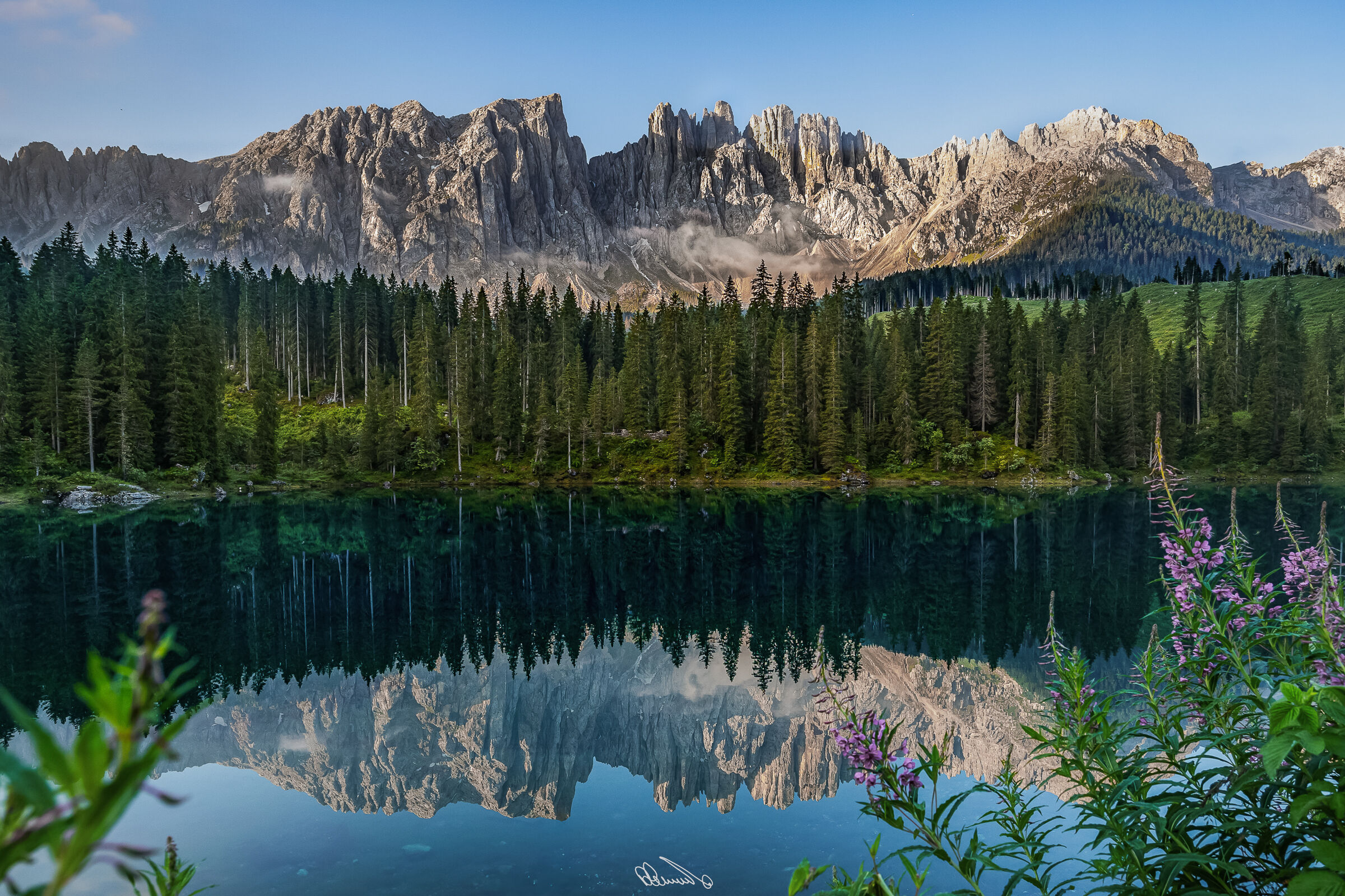 Morning lights on Lake Carezza