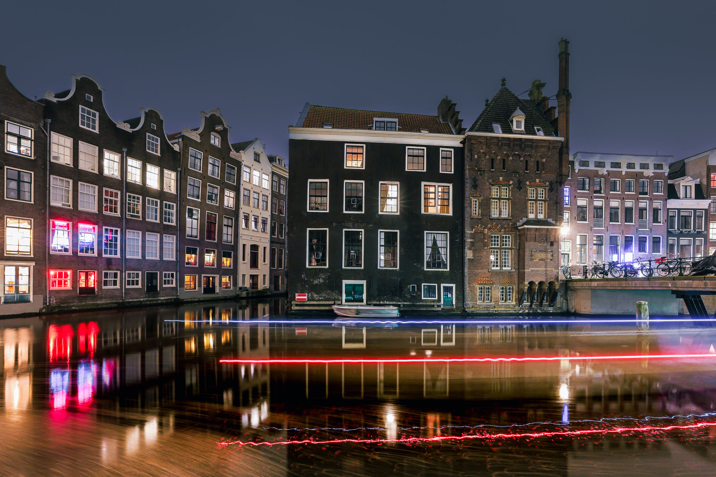 Reflections and lights on the water in Amsterdam