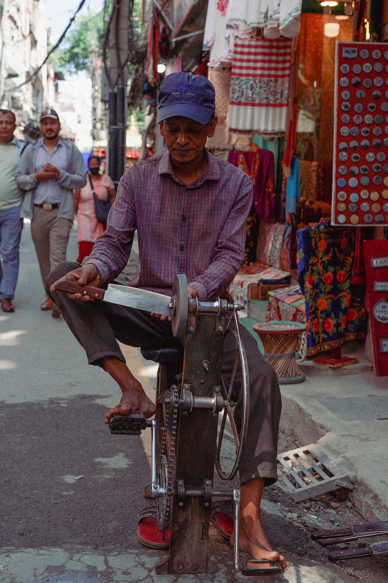 Sharpening knives in the street