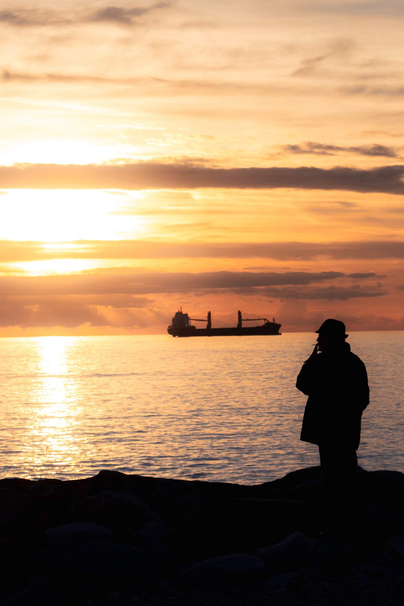The old man, the cigarette and the sea