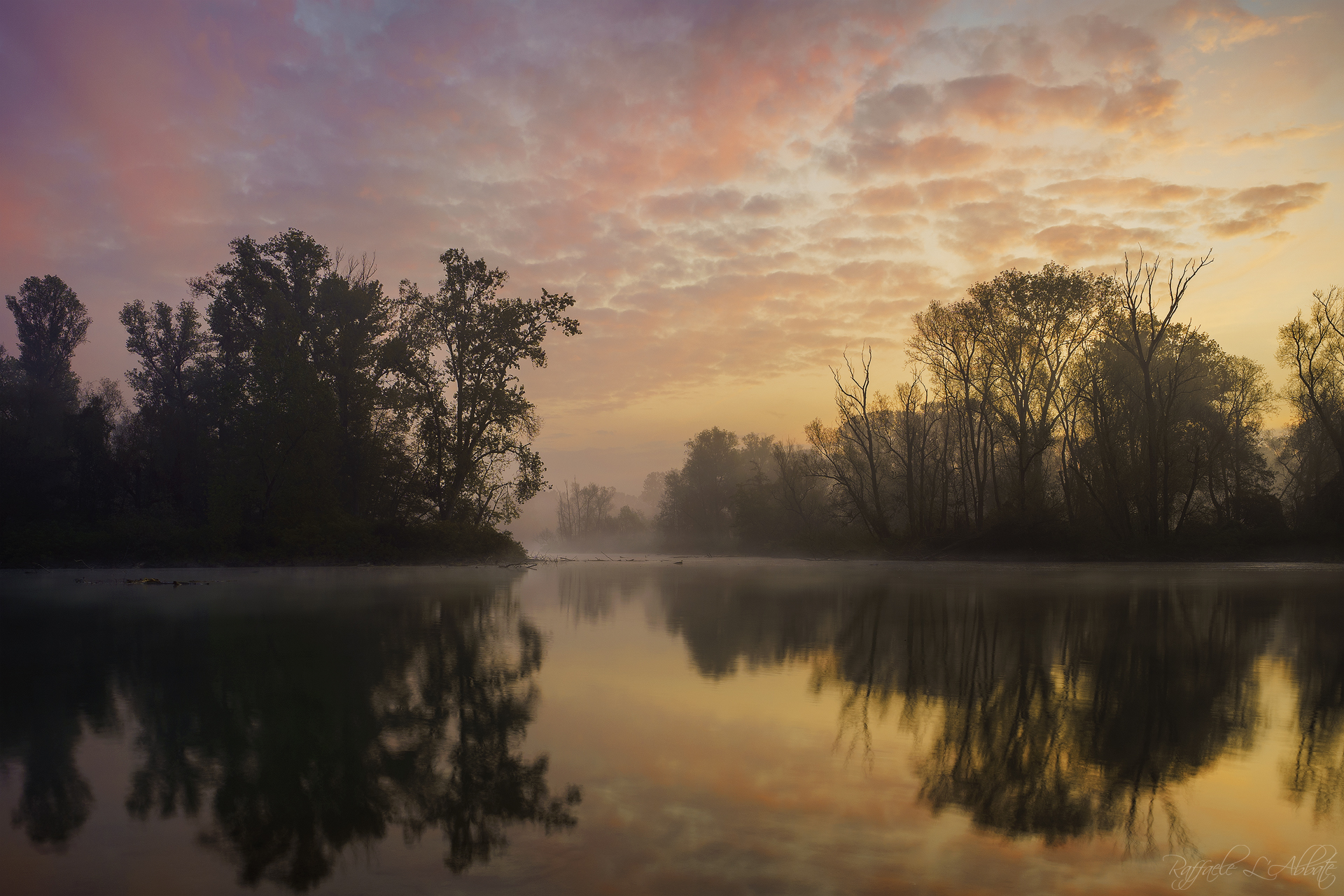 Alba sul fiume Adda.