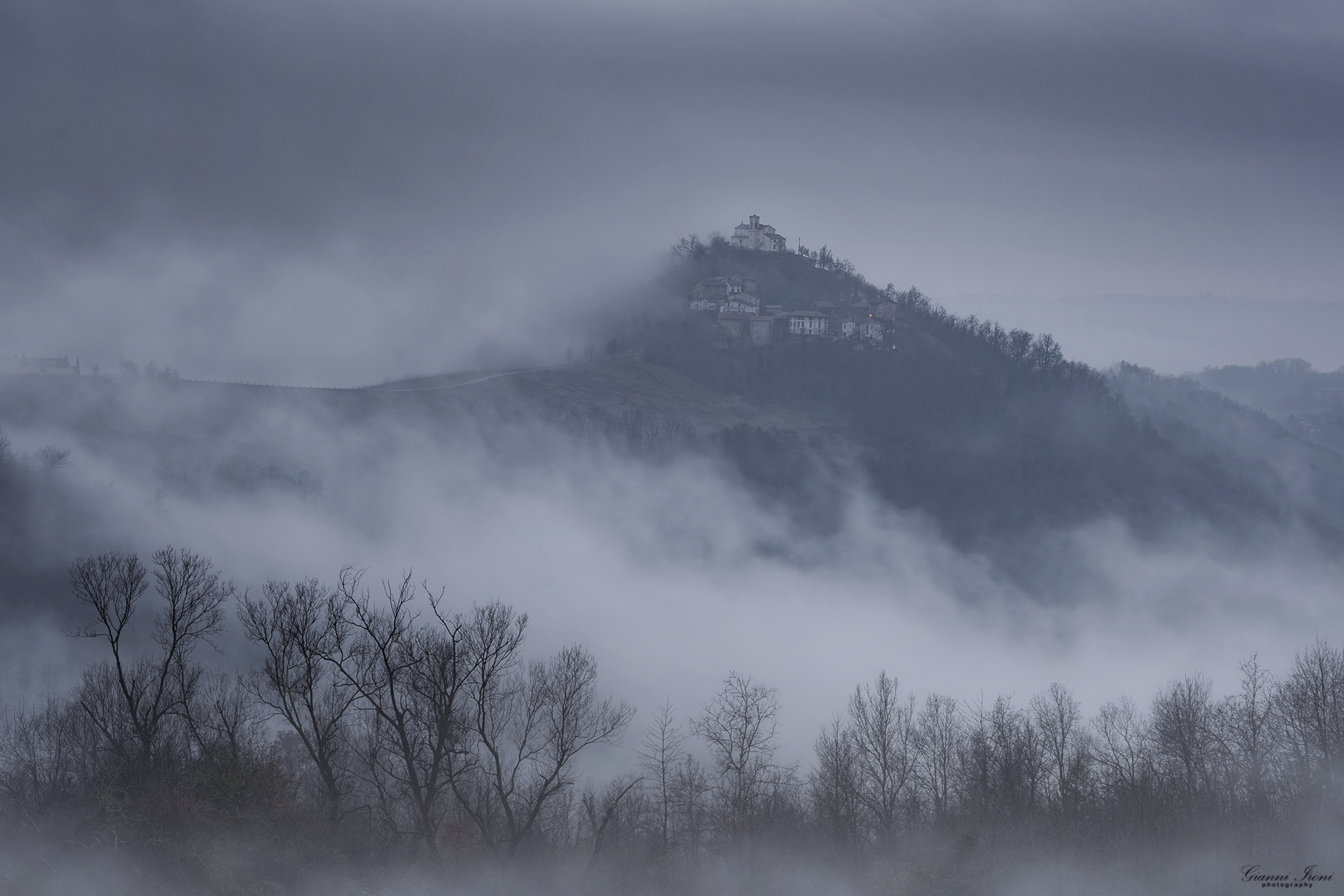 the fog to the steep hills
