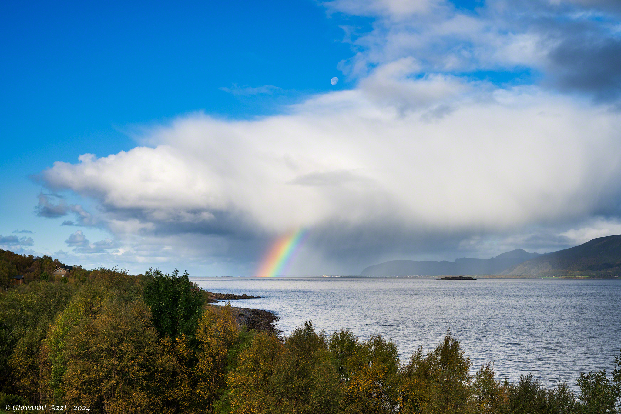 Moon, cloud and rainbow