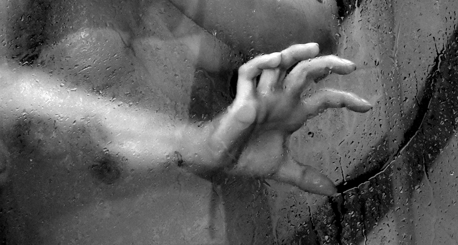 Behind the shower glass